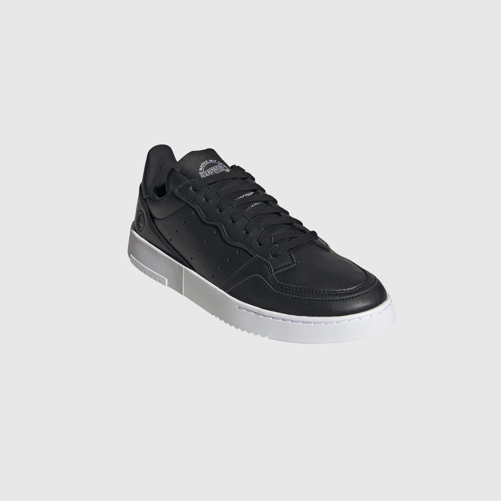 Adidas Supercourt Vegan - Core Black / Core Black / Footwear White Front Toebox