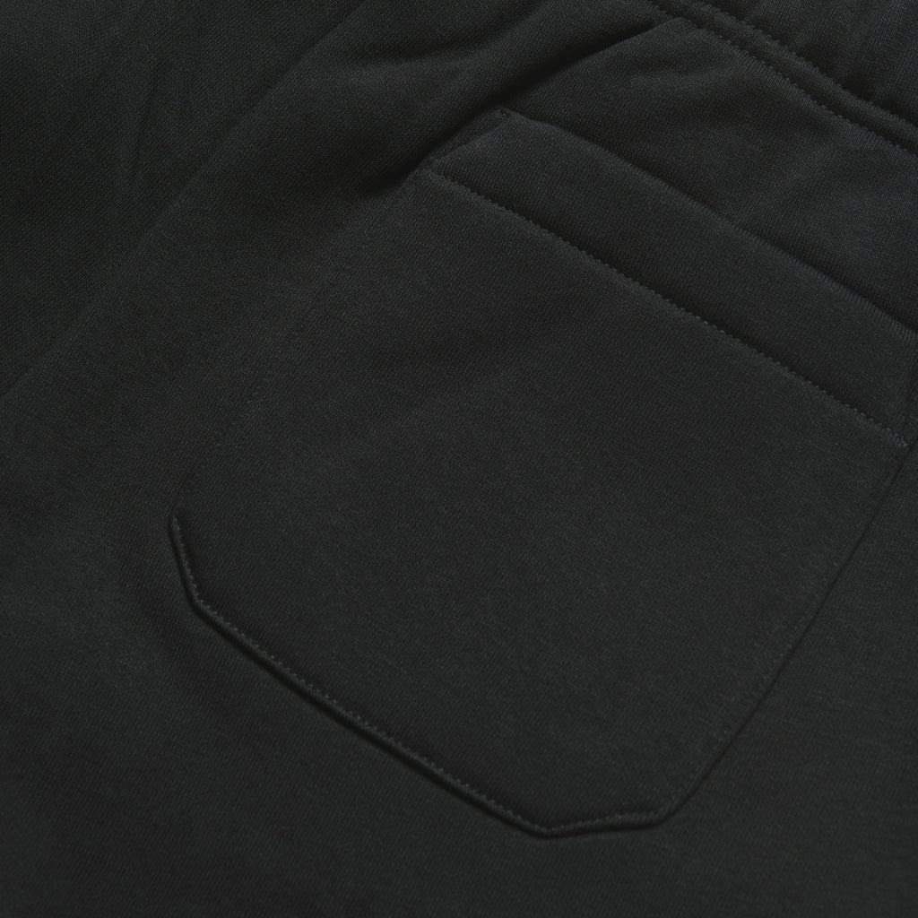 Carhartt WIP Chase Sweat Pant - Black / Gold Pocket Close Up