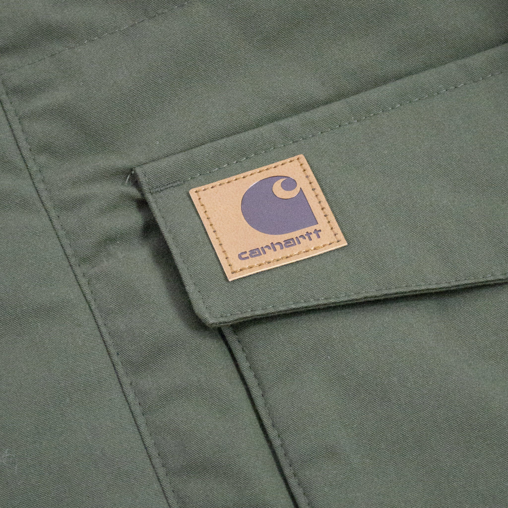  Carhartt WIP Trapper Parka - Cypress Faux Leather Logo Tab 